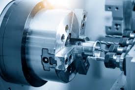 Close-up of a precision machining tool, showcasing a metal workpiece secured in a lathe chuck. This image emphasizes advanced manufacturing technology.