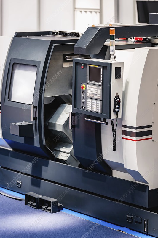Modern CNC lathe with an open front, showcasing its control panel and internal components. Relevant for discussions on advanced manufacturing technology.